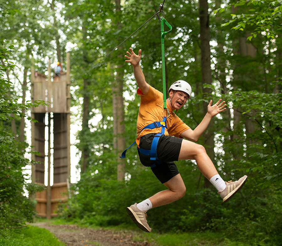 Person Going Down A Zipline